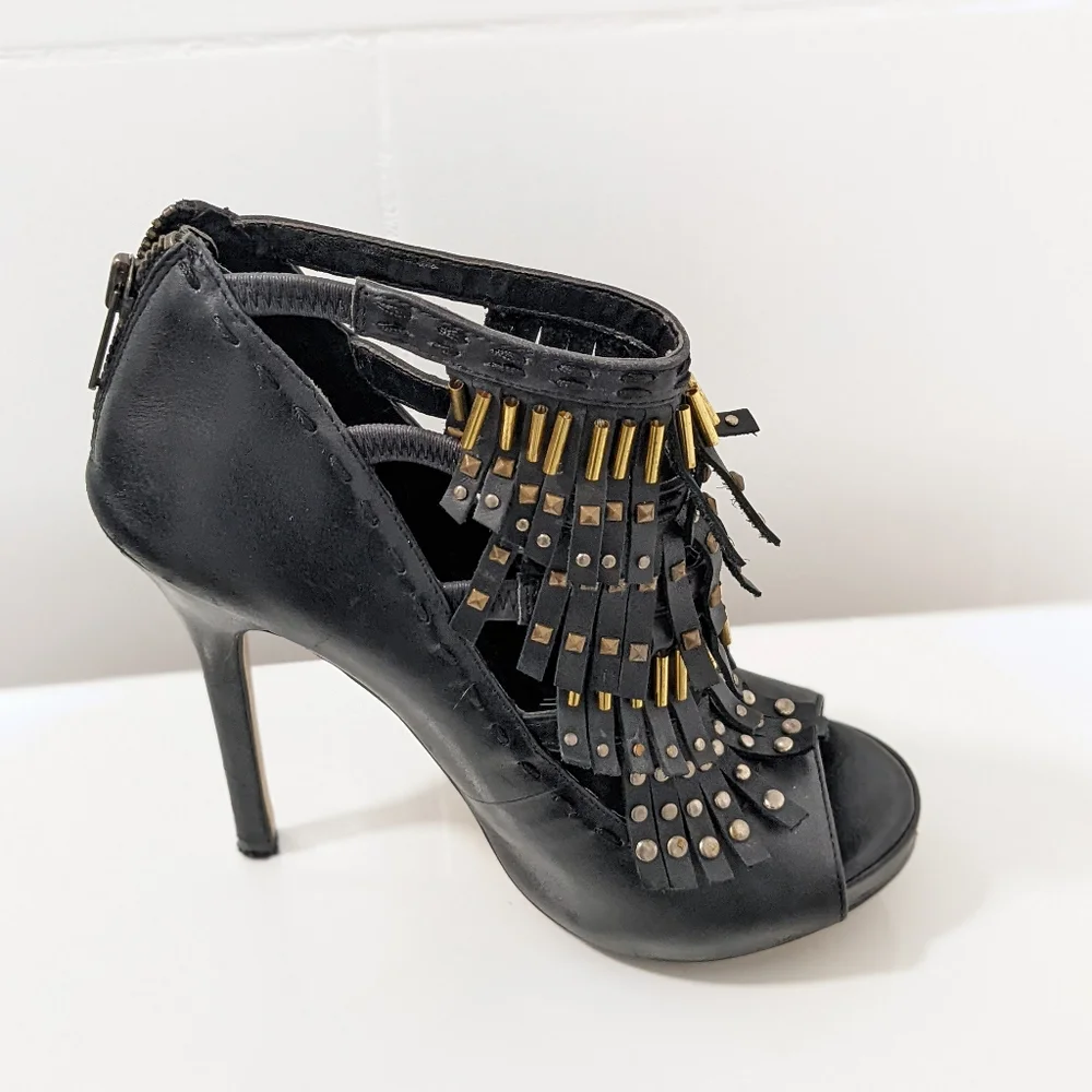 Leather heels by Aldo